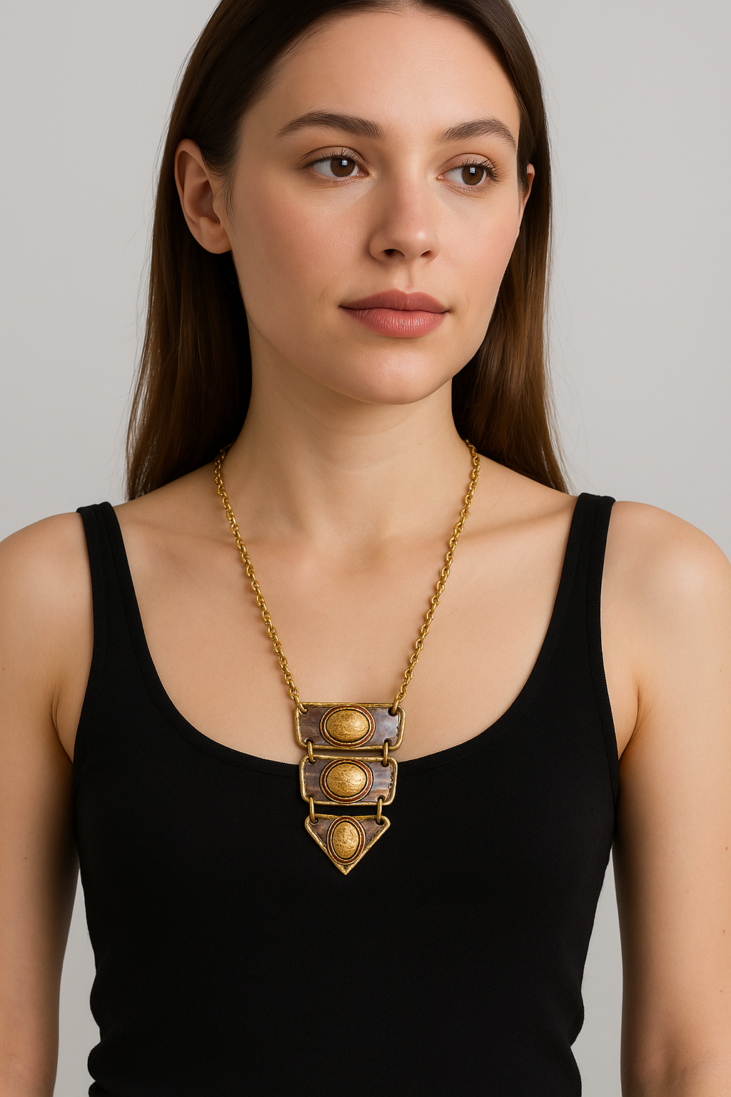 Mixed metal bib necklace accented with Jasper stones.