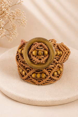 Brown wooden buckle macrame belt on model