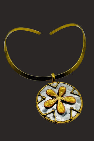 Gold choker on neck