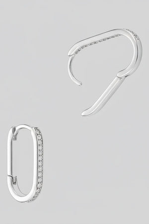 Gold dipped slim oval hoop earrings with sparkle