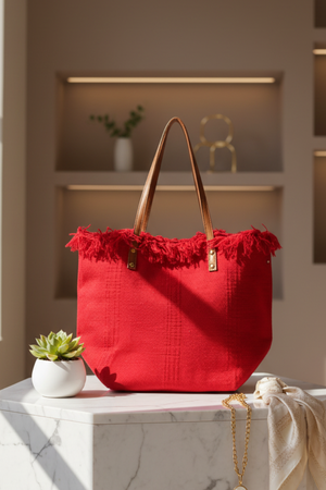 Red braided fringe canvas tote bag, front view