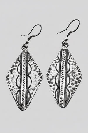 Tribal arrowhead earrings styled