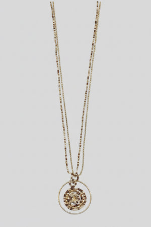 Artisanal beaded necklace in coffee and cream hues