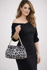 Tan black leopard chain accent clutch