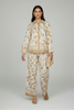 Floral button-down top and wide leg pants in beige