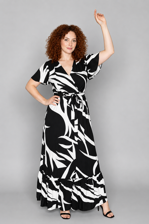 Crossover top maxi dress with waist-defining tie belt, back view