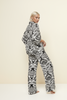 Midnight palms botanical two-piece set, styled on model