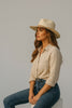 Floppy brim braided rope sun hat styled look