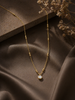 Gold pave coin pendant chain necklace on model