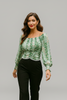 Off-shoulder floral blouse with cinched wrist sleeves
