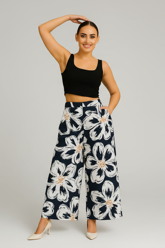 Black and white floral palazzo pants with elastic waistband, front view
