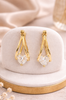 Teardrop rhinestone pincatch earrings, front view