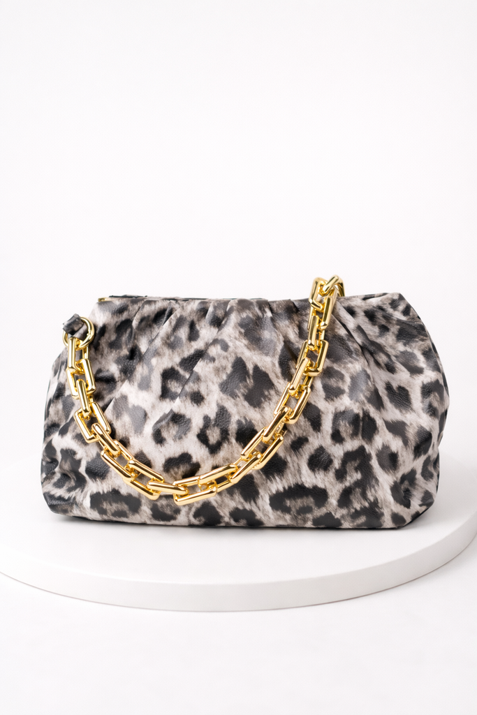 Tan and black leopard chain accent shoulder bag clutch