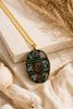 Brass copper patina oval and circle spiral necklace
