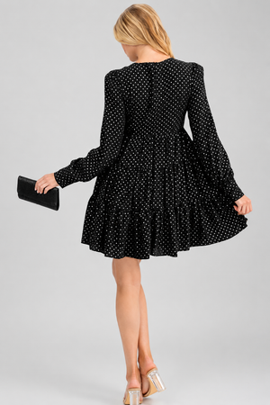 Polka dot print mini dress, side view on model