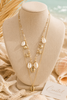Gold tone sea shell layered necklace