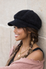 Textured eyelash knit newsboy cap styled