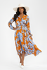 Asymmetric high-low wrap dress in sunset hues
