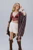 Sunset crochet ruana draped