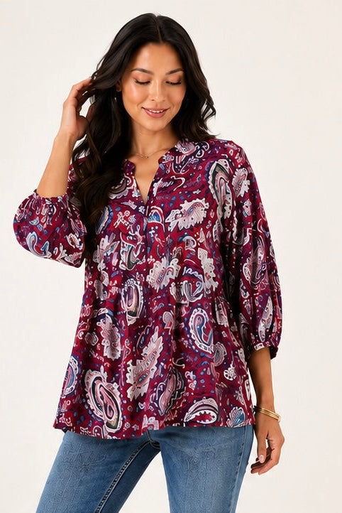 Free spirit paisley flow top with 3/4 sleeves, styled on model