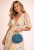 Artisan knitted floral bag