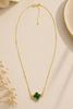 Gold-dipped emerald rhinestone clover pendant necklace