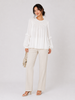 Ruffled sleeve smocked blouse close up