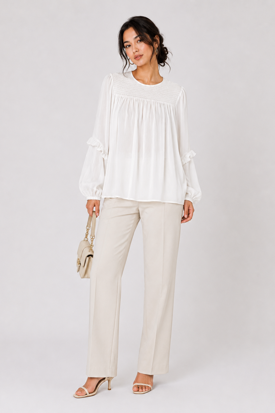 Ruffled sleeve smocked blouse close up