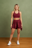 Sports bra and biker shorts side view