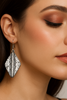 Antique silver tribal earrings close up