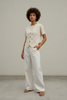 Ivory lace vest layering look
