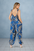Blue floral sleeveless jumpsuit in 100% polyester, side view