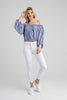 Printed off-shoulder top with puff sleeves, styled on model