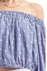 Off-shoulder top with floral embroidery print, side view