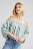 Puff sleeve embroidery top styled for warm weather