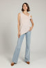 Asymmetrical twist neck top, side view