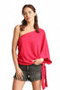 Fuchsia one-shoulder top showing asymmetric neckline