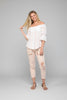 Solid off-shoulder twist-front top, front view