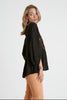 Embroidered peplum top with ruffled hemline and back keyhole