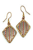Mixed metal diamond earrings close up