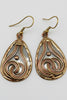 Silver copper gold teardrop swirl earrings styled