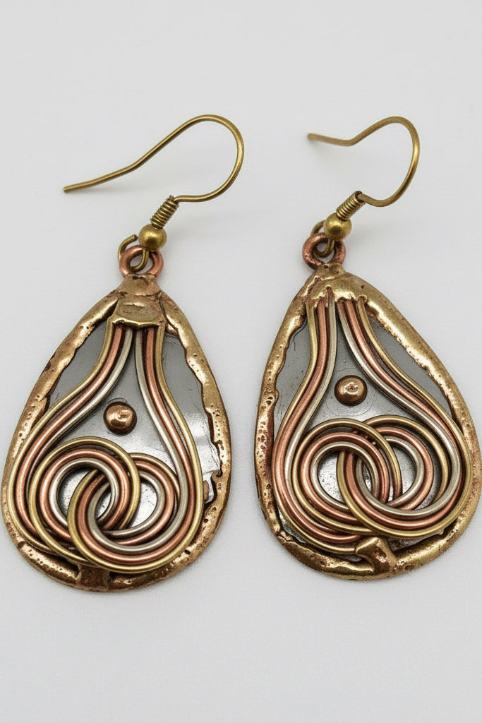 Silver copper gold teardrop swirl earrings styled