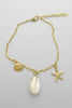 Gold sea shells coastal necklace close up
