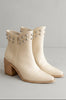 Ivory western ankle boot with metal stud detail