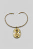 Mixed metal twist choker on neck