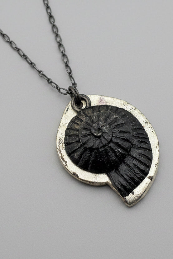 Nautilus shell pendant necklace side view