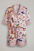 Soft pink two-piece pajama set, top and pants view