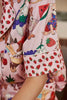 Strawberry trim pink pajama set on model