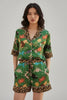 Green celestial two-piece pajama set with star trim