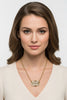 Mixed metal pendant necklace side view